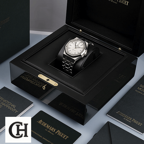 Audemars Piguet Royal Oak 15403IP.OO.1220IP.01 Audemars Piguet Royal Oak White Dial in the box next to warranty card