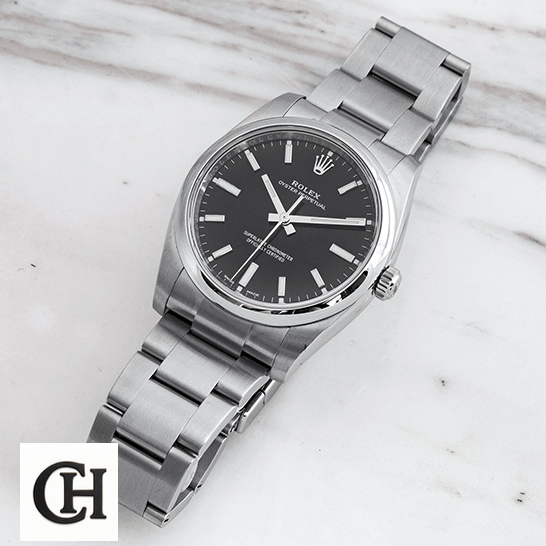 Rolex Air-King 114200 Oyster Perpetual "Black Dial" Signature rolex oyster perpetual 14200 0023 tiltedright Rolex Oyster Perpetual 14200-0023 white background