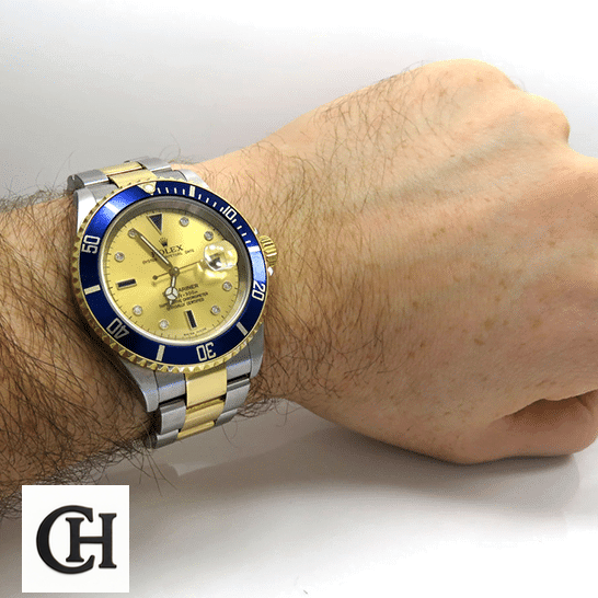 Rolex Submariner 16613 Rolex Submariner 16613 Two Tone Stainless Steel Gold Diamond Dial on his arm