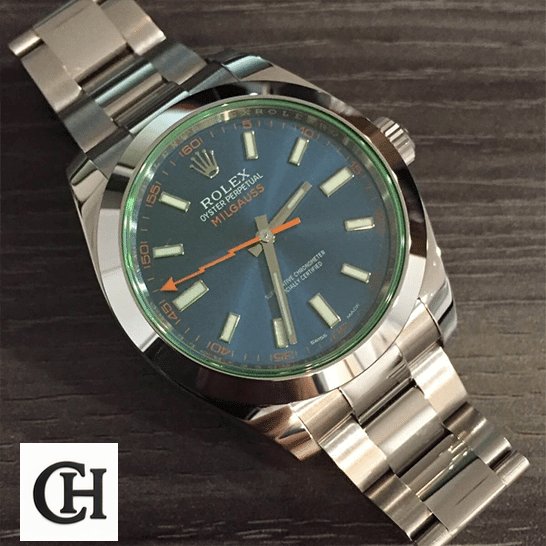 Rolex Milgauss Blue Dial 116400GV-0002 Edition Rolex Milgauss 116400GV-0002 Green Sapphire Crystal and Blue Dial Oyster on the table