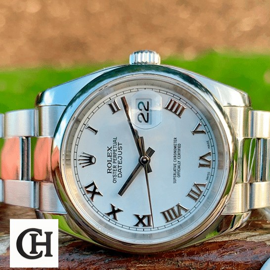 Rolex Datejust 116200 Collector’s Rolex Oyster Perpetual Datejust White Dial 116200 on the Table