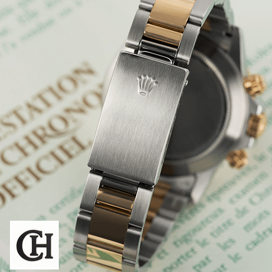 Rolex Daytona S.Steel Two Tone Bracelet Fold Clasp 16523 on the table
