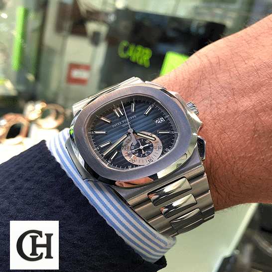 Patek Philippe Nautilus 5980/1A-001 Patek Philippe 59801 Steel Bracelet Blue on the man wrist