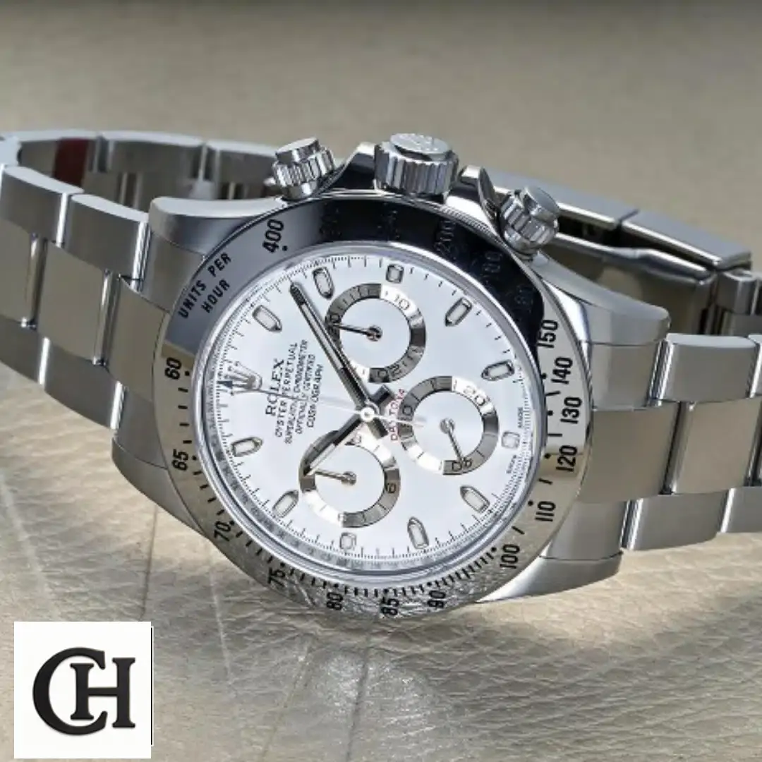 Rolex Cosmograph Daytona 116520 Pro Yeni Proje 2 Rolex Daytona White Dial 116520 S.Steel Oyster Bracelet on the table