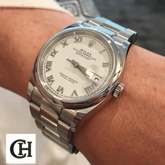 Rolex Datejust 126200-0008 White Dial rolex datejust 126200 0008 man The Rolex Datejust 126200-0008 on his arm