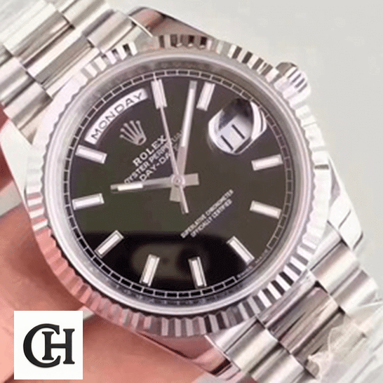 Rolex Day-Date 228239 Edition rolex day date 228239 ew stainless steel silver black dial left Rolex Day-Date 228239 Black Dial on the hand