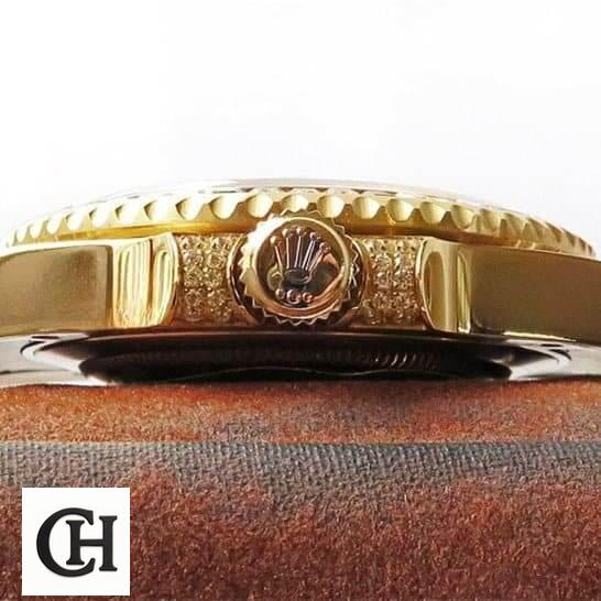 Rolex GMT-Master II 116718LN Rolex GMT-Master II 116748SANR Yellow Gold Crown Pusher