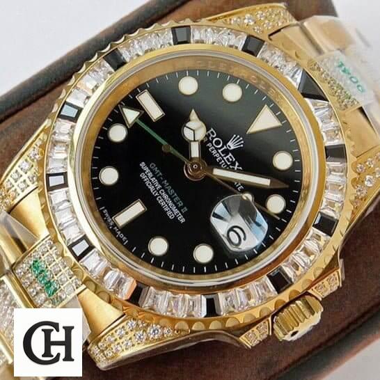 Rolex GMT-Master II 116748SANR Rolex GMT-Master II 116748SANR Yellow Gold Black Dial Iced Out