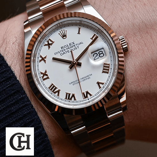 Rolex Datejust 126223 Two-Tone Rolex 126223 Datejust Roman Oyster Bracelet on the man wrist