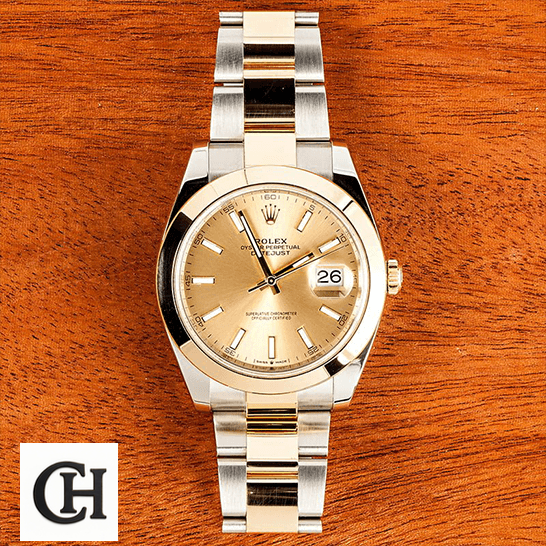 Rolex Datejust 126303 Two-Tone Premium Rolex Datejust 126303 Gold Dial on a wooden table