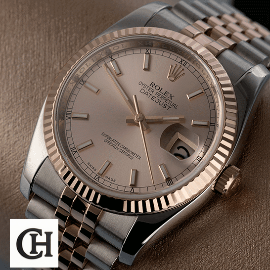 Rolex Datejust 126331-0010 "Sundust" Precision Rolex Datejust Sundust 126331-0010 Rose Gold Fluted Bezel on the table