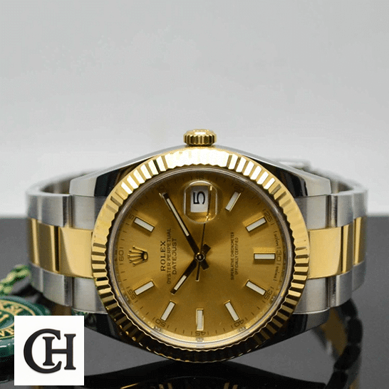 Rolex Datejust 126333 Oyster Perpetual Yellow Gold Rolex Datejust 126333 Champagne Dial Oyster Bracelet on the table