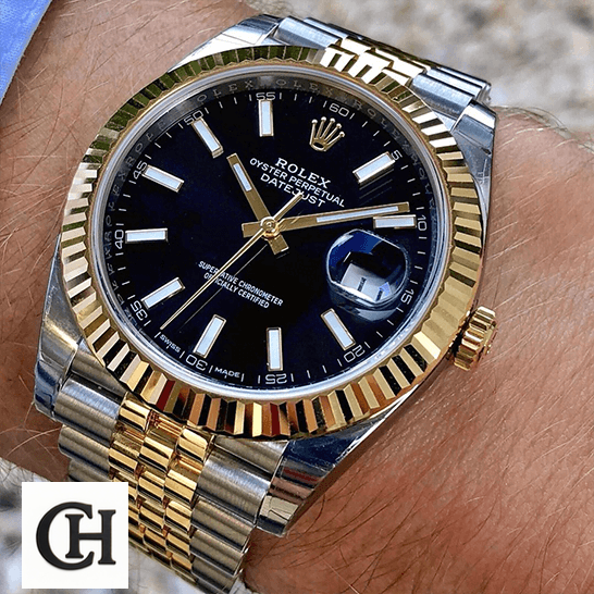Rolex Datejust 126333 Black Jubilee Premium Rolex Datejust 126333 Black Dial Yellow Gold on the man wrist