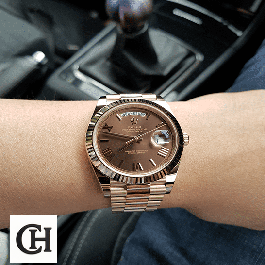 Rolex Day-Date 118139 Rolex Day-Date 40 228235-0002 Brown Dial with diamonds on his arm