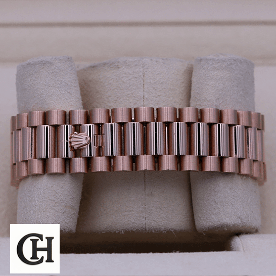 Rolex Day-Date 228235 Rolex Day-Date 228235 Rose Gold Bracelet on the Rolex logo