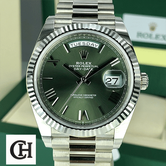 Rolex Day-Date 228239-0033 Rolex Day-Date Olive Green 228239 Rolex Box in front of