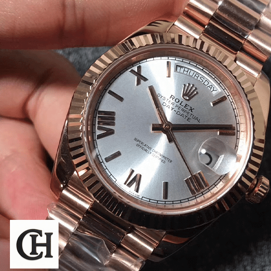 Rolex Day-Date 228235-0016 Rolex day-date roman wihte dial on the hand