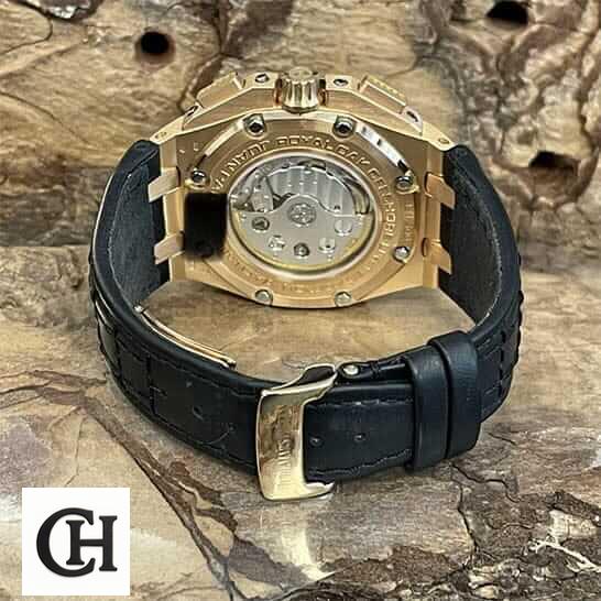 Audemars Piguet Royal Oak Offshore 26030IO.OO.D001IN.01 ap montoya black leather bracelet and swiss mechanism on the table