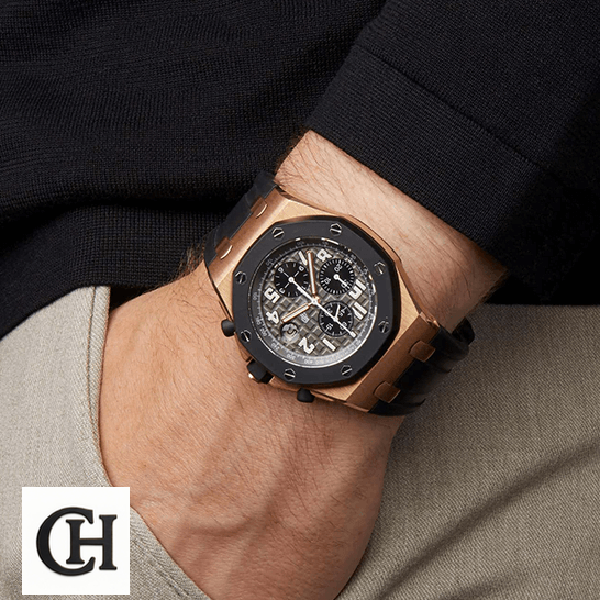 AP Royal Oak Offshore 25940OK.OO.D002CA.01 United Luxury Shop audemars piguet royal oak o ffshore 25940OK.OO.D002CA.01 hand 1 Audemars Piguet Black Dial Gold Case on the man wrist