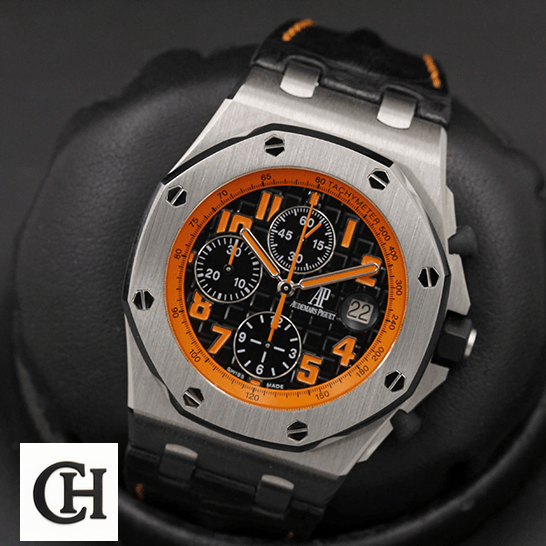 Audemars Piguet Orange Black Dial in the black stand