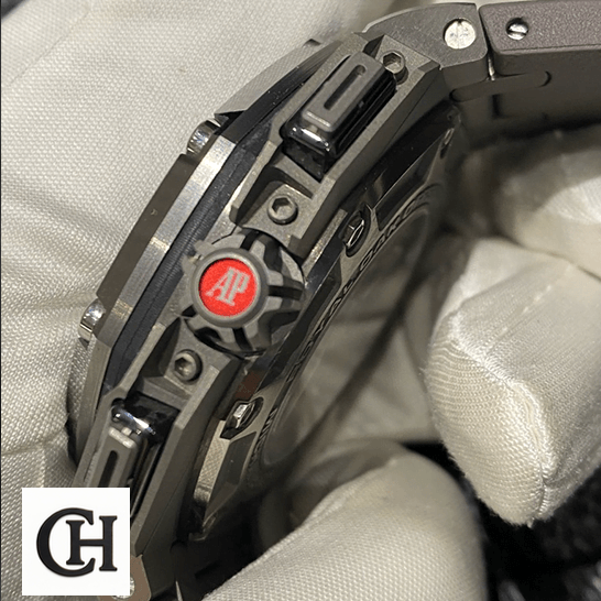 Audemars Piguet Royal Oak Offshore 26568IM.OO.A004CA.01 Audemars Piguet Roytal Oak Carbon red crwon and on the white glove hand