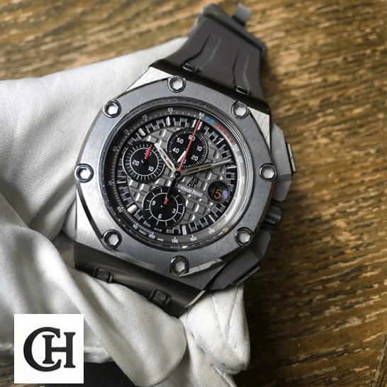 Audemars Piguet Royal Oak Offshore 26568IM.OO.A004CA.01 Audemars Piguet Royal Oak Grey Dial Steel Bezel on te white glove hand