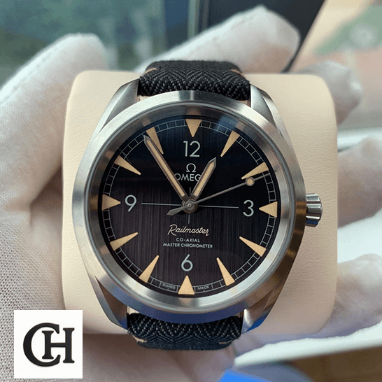 Omega Railmaster Co-Axial Master Chronometer Black Dial 220.12.40.20.01.001 Detailed omega seamaster 220.12.40.20.01 front Omega Railmaster Black Dial & Buckle Bracelet on the white glove hand