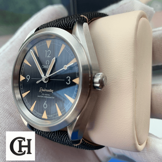 Omega Railmaster Co-Axial Master Chronometer Black Dial 220.12.40.20.01.001 Detailed omega seamaster 220.12.40.20.01 rightside Omega Railmaster Black Dial Steel Case on the stand