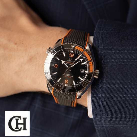 Omega Column Wheel omega seamaster planet ocean 215.32.44.21.01.001 man 1 Omega Seamaster Orange Black Dial on the wrist