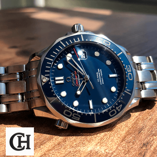 Omega Seamaster Diver Co-Axial Master Chronometer 212.30.41.20.03.001 High-End Omega Seamaster 300m Axial Steel on the wooden table