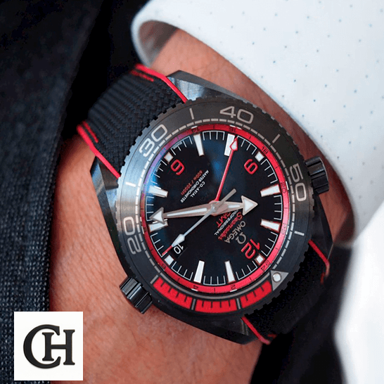 Omega Seamaster Planet Ocean Co-Axial Master Chronometer 215.92.46.22.01.003 Omega Seamaster GMT Black Dial Red Bezel on the wrist