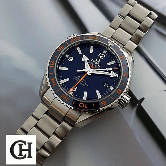 Omega Seamaster Blue Dial Oyster Steel grey background