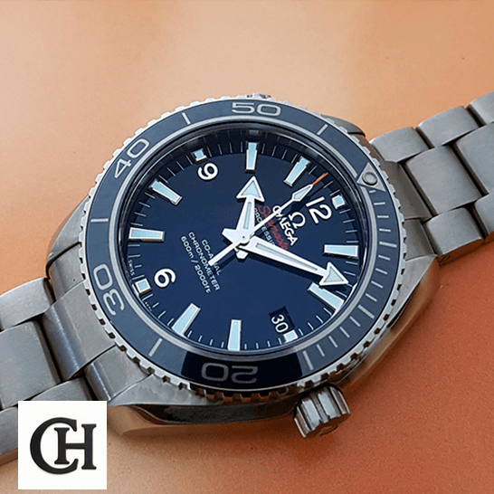 Omega Seamaster Planet Ocean 232.90.42.21.03.001 Blue Dial Near Original omega seamaster planet ocean steel 232 90 42 21 03 001 blue dial right side Omega Seamaster 232_90_42_21_03_001 Blue Dial Steel rose background
