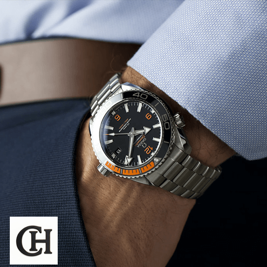 Omega Seamaster Planet Ocean Co-Axial Master Chronometer 215.30.44.21.01.002 omega seamaster planet ocean steel hand Omega Black Dial Orange Bracelet Oyster on the man in the suit