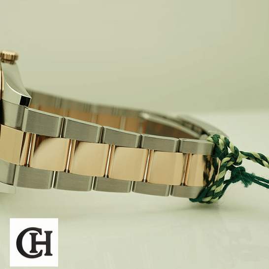Rolex Datejust 41 126331-0013 Two Tone Oyster Bracelet on the table