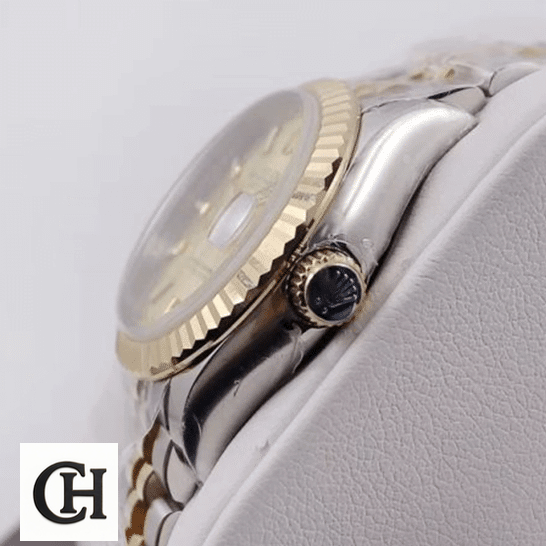 Rolex Datejust Steel Yellow Gold 279173 side pose on the box
