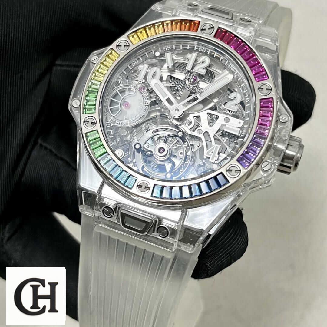 Hublot Big Bang Unico Hublot Big Bang Rainbow Bezel White Rubber Bracelet on the black glove hand