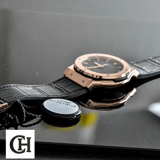 Hublot Classic Fusion Gold Bezel Black Leather Bracelet black background