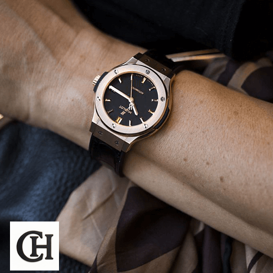 Hublot Classic Fusion Gold Bezel Black Dial on the man wrist