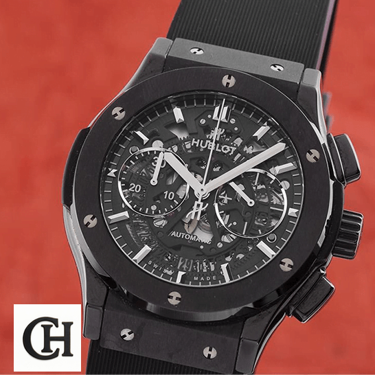 Hublot Big Bang Unico "Black Magic" Skeleton 525.CM.0170.RX First-Class hublot big bang 525.CM.0170.RX man Hublot Big Bang Black Dial Steel Case crown / push button red background