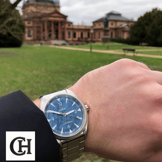 Omega 220.10.40.20.03.001 Seamaster Blue Dial mansion background