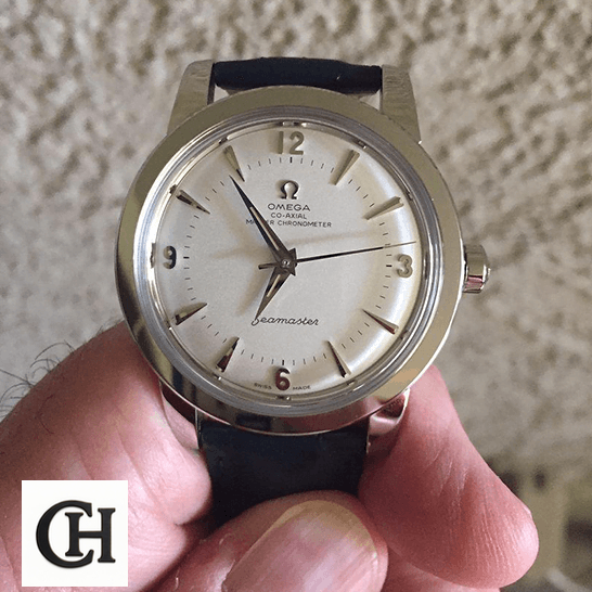 Omega Seamaster 1948 Central Seconds 511.13.38.20.02.001 First-Class omega seamaster 511.13.38.20.02.001 front Omega Seamaster 511.13.38.20.02.001 White Dial on the hand