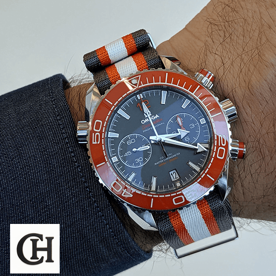 Omega Seamaster Planet Ocean 215.32.46.51.99.001 "Grey" Premium Duplicate Edition omega seamaster planet ocean 215.32.46.51.99.001 hand Omega Seamaster Orange Bezel on the man wrist