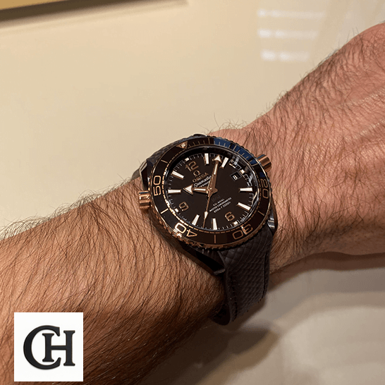 Omega Seamaster Diver Ceramic 215.62.40.20.13.001 Ultra Accurate Omega Seamaster Brown Dial Leather Bracelet on the man wrist