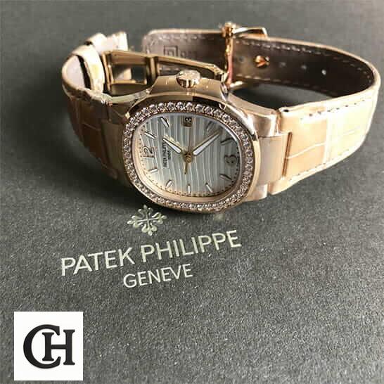 Patek Philippe Nautilus 7010R-011 "Silver Dial" High Fidelity patek 7010r 011 1 Patek Philippe 7010 Diamond Bezel Leather Bracelet on the grey carpet