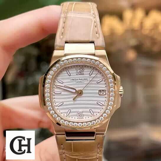 Patek Philippe Nautilus 7010R-011 "Silver Dial" High Fidelity patek 7010r 011 3 Patek Philippe Nautilus Leather Bracelet Diamond Bezel on the hand
