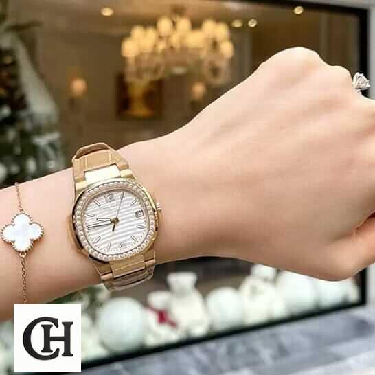 Patek Philippe Nautilus 7010R-011 "Silver Dial" High Fidelity patek 7010r 011 4 Patek Philippe Diamond Bezel Leather Bracelet on the women wrist