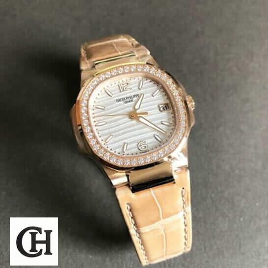 Patek Philippe Nautilus 7010R-011 "Silver Dial" High Fidelity patek 7010r 011 Patek Philippe Geneve 7010 Diamond Bezel Leather Bracelet grey background
