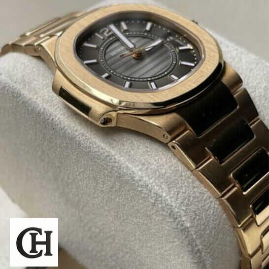 Patek Philippe Nautilus 7011/1R "Rose Gold" Exact Duplicate Quality patek 7011 1r 010 4 Patek Philippe 7011-1R-010 Black Dial Gold Case on the stand