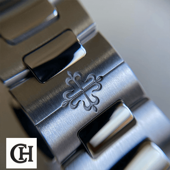 Patek Philippe Nautilus 7118/1A "Smoke Gray Dial" Premium Edition patek philippe nautilus 71181A 011 clips Patek Philippe Nautilus 71181A-011 Stainless Steel Bracelet clasp on the logo